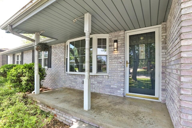 3729 S Parklane Ave, Springfield, MO 65807 - view of exterior entry with a porch and brick siding