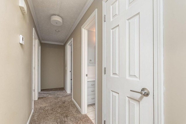 3729 S Parklane Ave, Springfield, MO 65807 - hall featuring light carpet, a textured ceiling, and ornamental molding