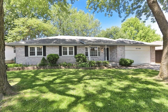 3729 S Parklane Ave, Springfield, MO 65807 - single story home featuring an attached garage, brick siding, a front yard, and driveway