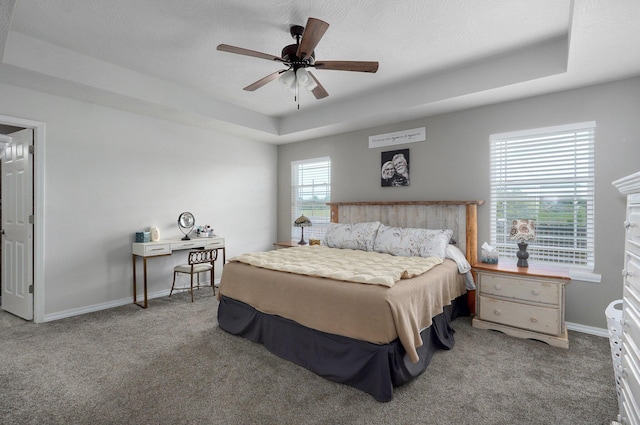 8863 Lawrence Unit 2220, Monett, MO 65708 - bedroom with carpet flooring, a raised ceiling, baseboards, and ceiling fan