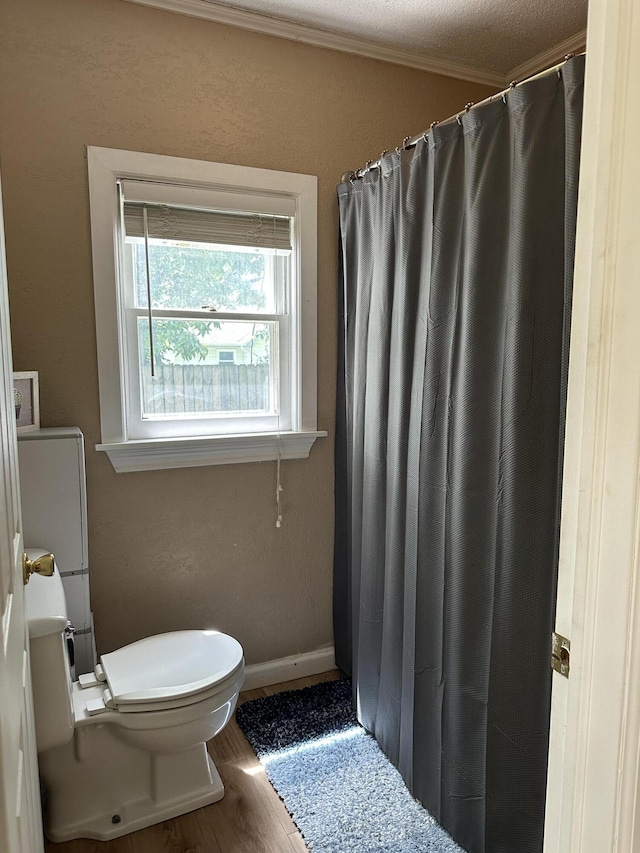 645 N Walnut Ave, Republic, MO 65738 - full bathroom featuring toilet, ornamental molding, wood finished floors, and a shower with curtain