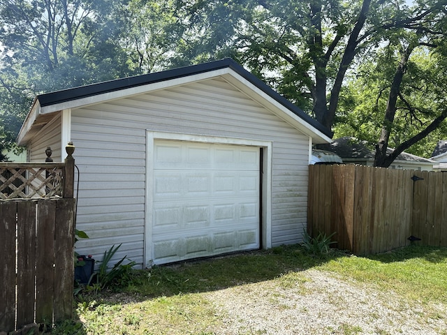 645 N Walnut Ave, Republic, MO 65738 - detached garage featuring fence and driveway