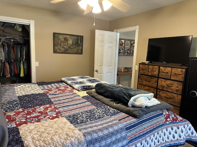 645 N Walnut Ave, Republic, MO 65738 - bedroom with a walk in closet, a closet, and ceiling fan