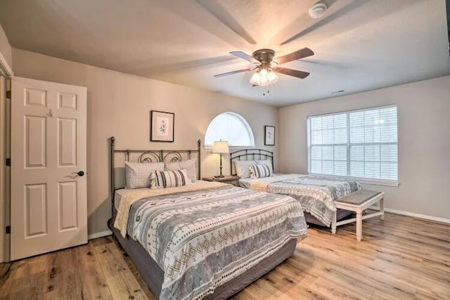 120 Spring Creek Ct Unit 12, Branson, MO 65616 - bedroom featuring wood finished floors, baseboards, and a ceiling fan