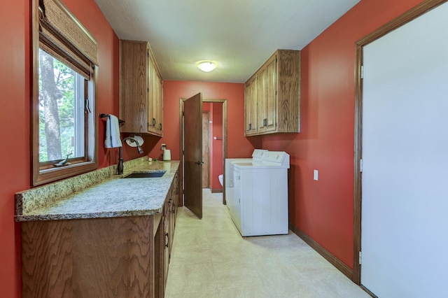 1605 Hideaway Rd, Galena, MO 65656 - washroom with cabinet space, separate washer and dryer, light floors, and baseboards