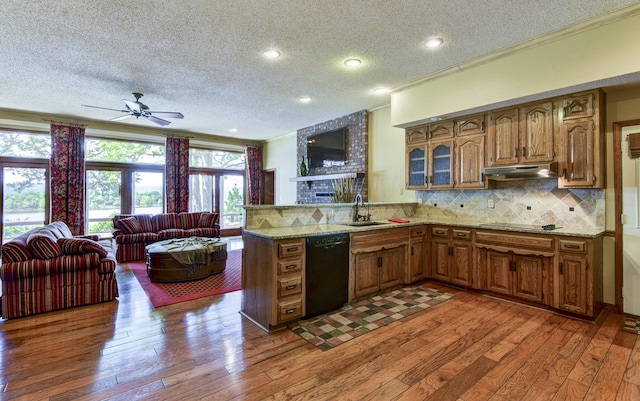 1605 Hideaway Rd, Galena, MO 65656 - kitchen featuring black appliances, a textured ceiling, crown molding, open floor plan, and brown cabinets