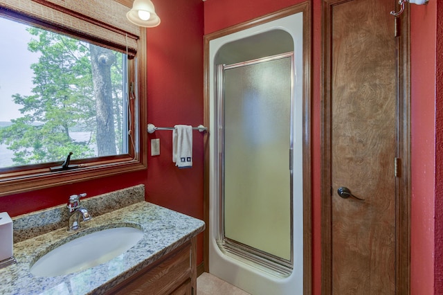 1605 Hideaway Rd, Galena, MO 65656 - full bath featuring a stall shower, plenty of natural light, and vanity