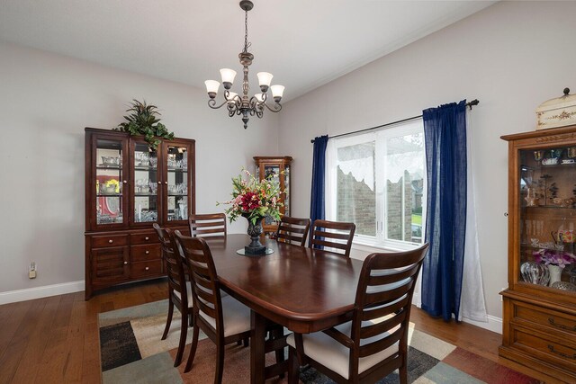 2310 Lakeside Ct, Ozark, MO 65721 - dining space featuring wood finished floors, a chandelier, and baseboards