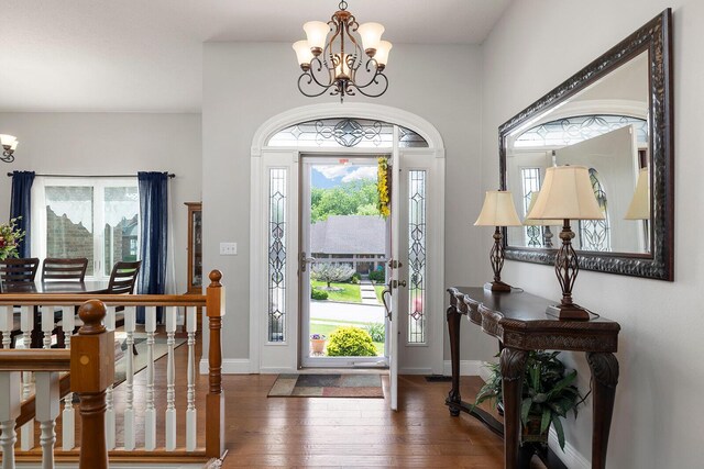 2310 Lakeside Ct, Ozark, MO 65721 - foyer featuring a chandelier, wood finished floors, and baseboards