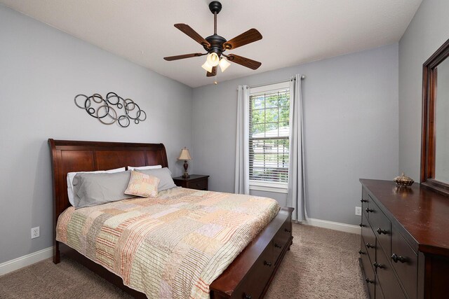 2310 Lakeside Ct, Ozark, MO 65721 - bedroom featuring light carpet, baseboards, and a ceiling fan