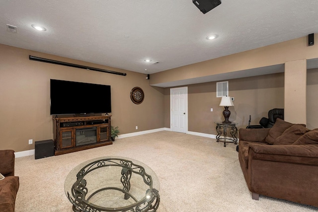 2310 Lakeside Ct, Ozark, MO 65721 - living area featuring carpet floors, baseboards, recessed lighting, and a textured ceiling
