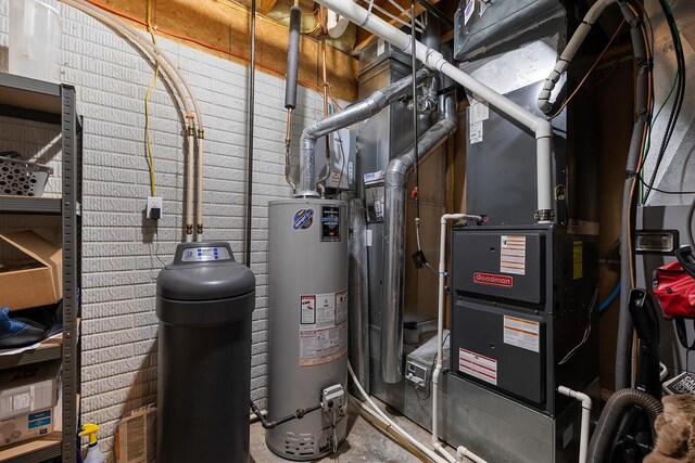 2310 Lakeside Ct, Ozark, MO 65721 - utility room featuring water heater and heating unit