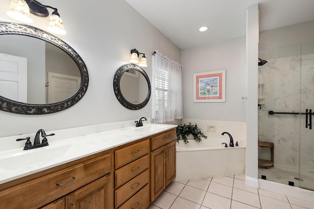 2310 Lakeside Ct, Ozark, MO 65721 - full bath with a shower stall, tile patterned flooring, a garden tub, double vanity, and recessed lighting