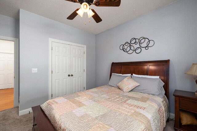 2310 Lakeside Ct, Ozark, MO 65721 - carpeted bedroom with a closet, a ceiling fan, and baseboards