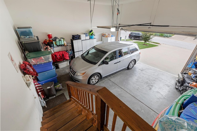 2310 Lakeside Ct, Ozark, MO 65721 - garage featuring a garage door opener