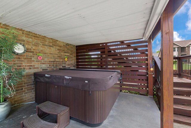2310 Lakeside Ct, Ozark, MO 65721 - view of patio featuring a hot tub and a deck