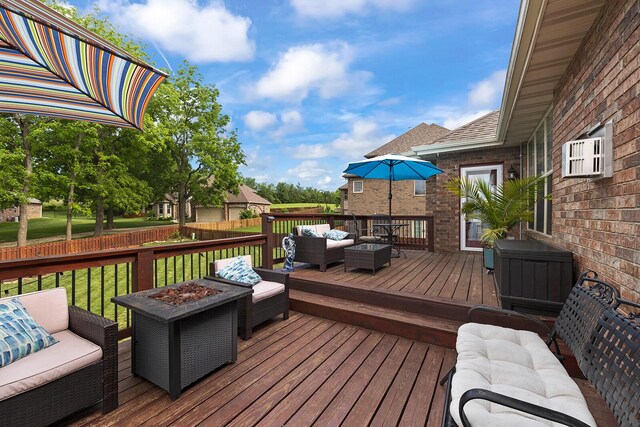 2310 Lakeside Ct, Ozark, MO 65721 - deck featuring an outdoor living space with a fire pit and fence