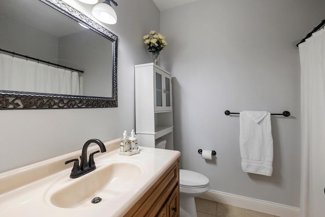 2310 Lakeside Ct, Ozark, MO 65721 - bathroom with tile patterned floors, vanity, toilet, and baseboards