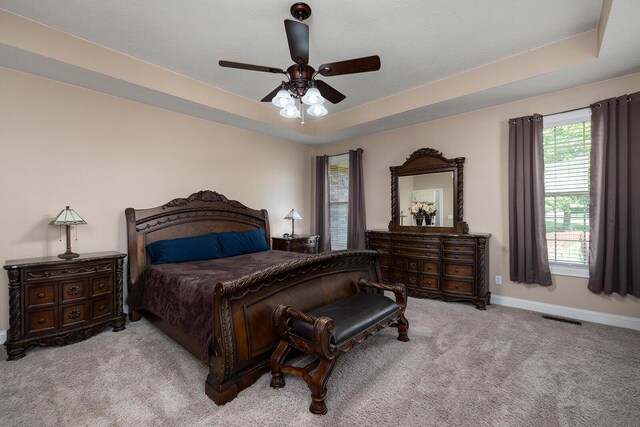 2310 Lakeside Ct, Ozark, MO 65721 - bedroom with carpet floors, baseboards, and a ceiling fan