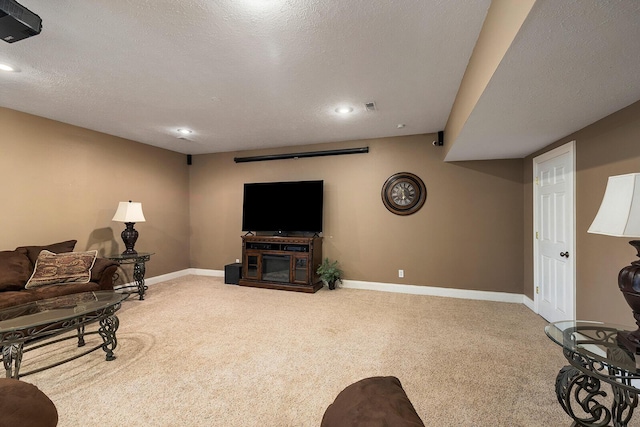 2310 Lakeside Ct, Ozark, MO 65721 - living room with carpet, baseboards, recessed lighting, and a textured ceiling
