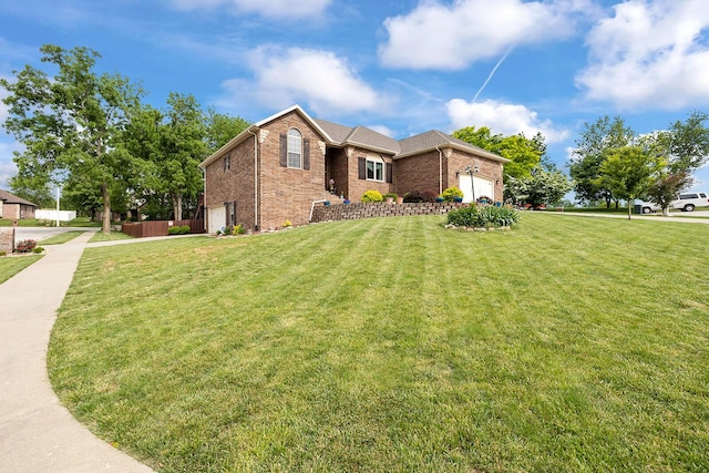 2310 Lakeside Ct, Ozark, MO 65721 - view of property exterior featuring brick siding, an attached garage, and driveway