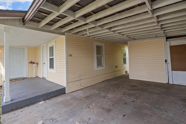 1433 E 24th St N, Springfield, MO 65803 - view of patio / terrace with an attached carport