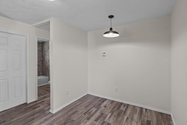 1433 E 24th St N, Springfield, MO 65803 - empty room with dark wood-type flooring and baseboards