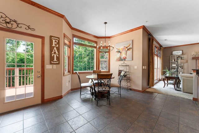 261 Country Bluff Dr, Branson, MO 65616 - dining room featuring plenty of natural light, a chandelier, baseboards, and crown molding