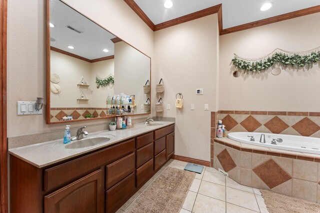 261 Country Bluff Dr, Branson, MO 65616 - full bathroom featuring ornamental molding, double vanity, a garden tub, tile patterned flooring, and baseboards