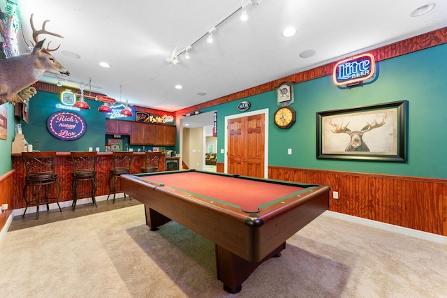 261 Country Bluff Dr, Branson, MO 65616 - playroom featuring a dry bar, wainscoting, wood walls, light carpet, and pool table