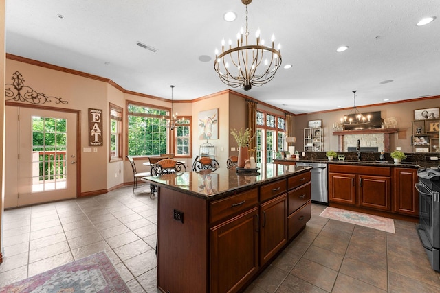 261 Country Bluff Dr, Branson, MO 65616 - kitchen with a chandelier, stainless steel appliances, recessed lighting, plenty of natural light, and a center island