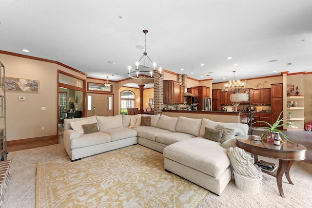261 Country Bluff Dr, Branson, MO 65616 - living area with a chandelier, ornamental molding, recessed lighting, baseboards, and light carpet