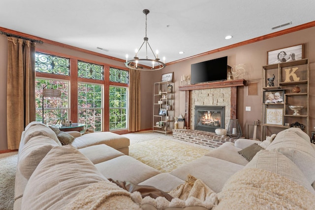 261 Country Bluff Dr, Branson, MO 65616 - carpeted living room with a chandelier, crown molding, a glass covered fireplace, baseboards, and recessed lighting