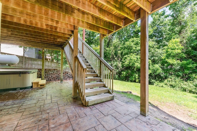261 Country Bluff Dr, Branson, MO 65616 - view of patio featuring stairway and a hot tub