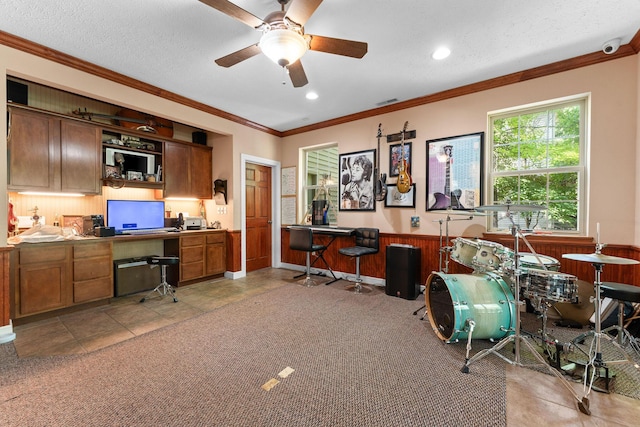 261 Country Bluff Dr, Branson, MO 65616 - office area with ceiling fan, crown molding, a wainscoted wall, wooden walls, and recessed lighting