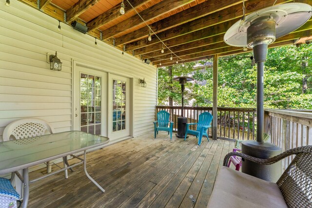 261 Country Bluff Dr, Branson, MO 65616 - wooden deck with outdoor dining area