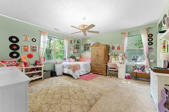 261 Country Bluff Dr, Branson, MO 65616 - carpeted bedroom with a textured ceiling and ceiling fan