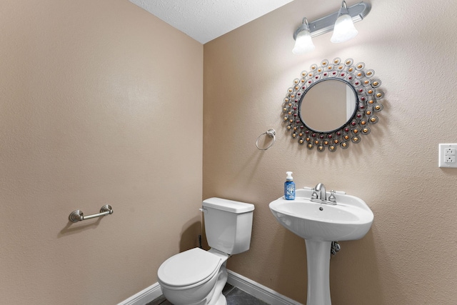 261 Country Bluff Dr, Branson, MO 65616 - bathroom with toilet and baseboards
