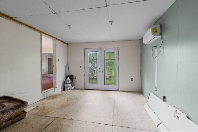 537 S Jefferson Ave, Aurora, MO 65605 - spare room with french doors and a wall mounted AC