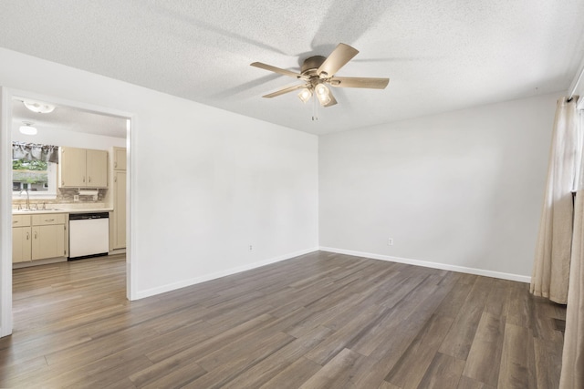 127 Wilson Way, Marshfield, MO 65706 - unfurnished room with a sink, ceiling fan, dark wood-style flooring, a textured ceiling, and baseboards