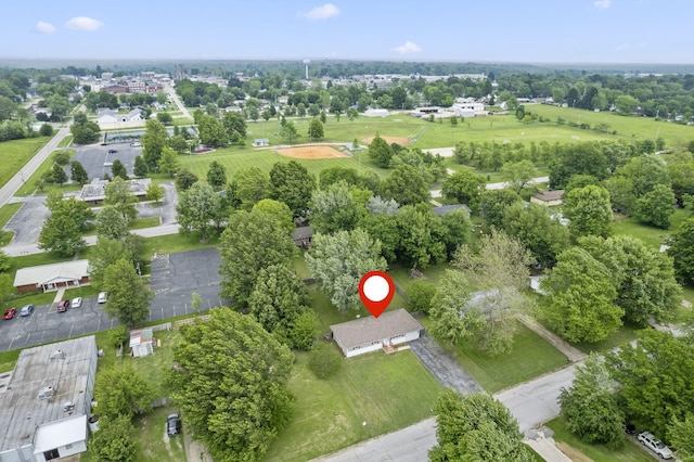 127 Wilson Way, Marshfield, MO 65706 - aerial view of property and surrounding area with a tree filled landscape