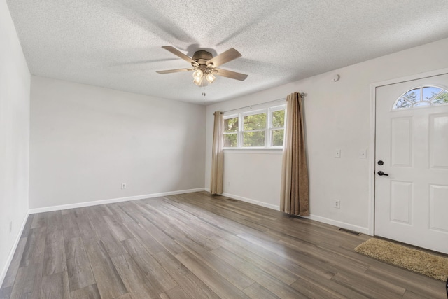 127 Wilson Way, Marshfield, MO 65706 - entryway with ceiling fan, wood finished floors, a textured ceiling, and baseboards