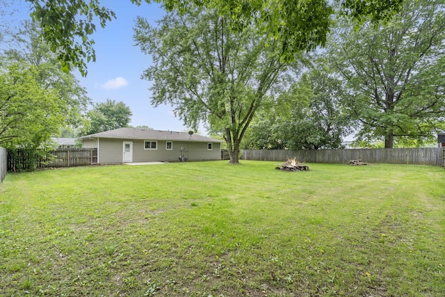 127 Wilson Way, Marshfield, MO 65706 - view of yard featuring an outdoor fire pit and a patio area
