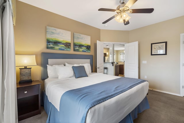 2800 Green Mountain Dr Unit 231, Branson, MO 65616 - carpeted bedroom featuring baseboards and ceiling fan
