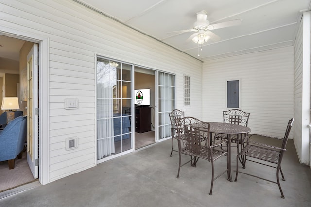 2800 Green Mountain Dr Unit 231, Branson, MO 65616 - sunroom featuring a ceiling fan, electric panel, and outdoor dining space