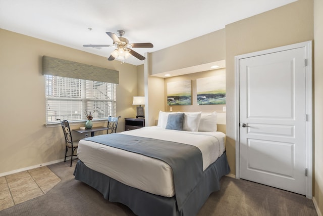 2800 Green Mountain Dr Unit 231, Branson, MO 65616 - bedroom featuring baseboards, a ceiling fan, and carpet