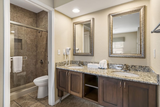 2800 Green Mountain Dr Unit 231, Branson, MO 65616 - full bath with a stall shower, toilet, and double vanity