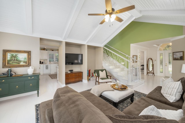 2820 Waters Edge Blvd, Joplin, MO 64801 - living room featuring stairs, beamed ceiling, ceiling fan, high vaulted ceiling, and light wood-style floors