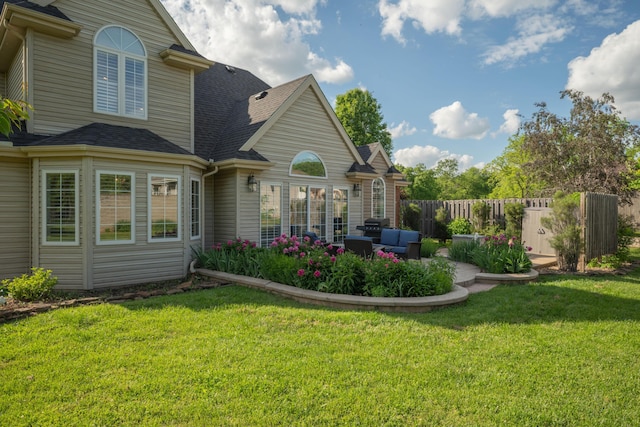 2820 Waters Edge Blvd, Joplin, MO 64801 - back of house with roof with shingles, a patio, and an outdoor hangout area