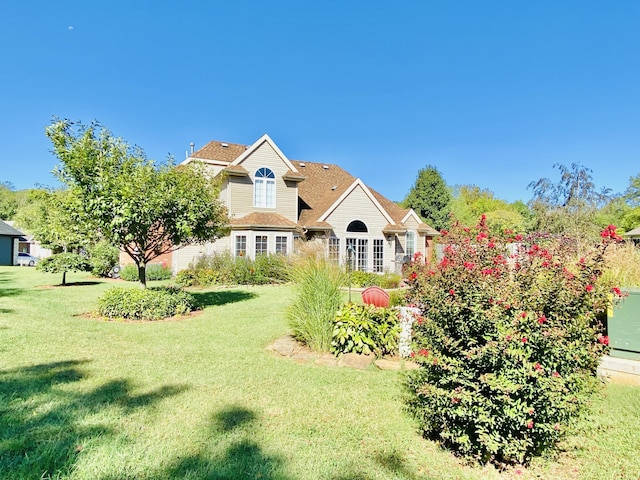 2820 Waters Edge Blvd, Joplin, MO 64801 - view of front of house with a front yard and a shingled roof